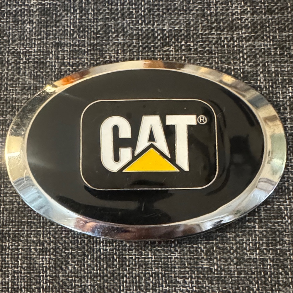 Vintage Caterpillar Black and Silver Oval Belt Buckle